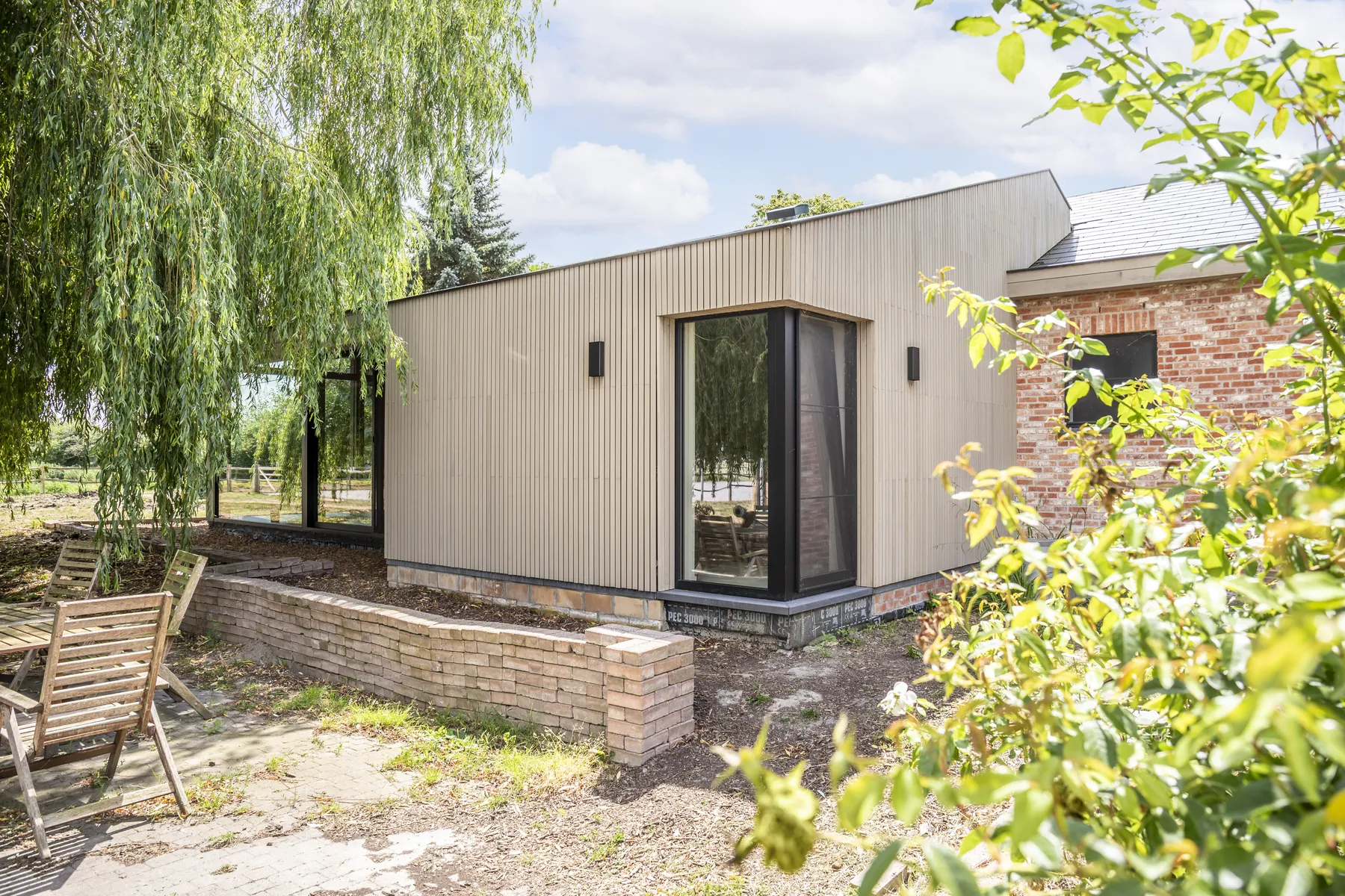 Renovation and extension of a house DC Fortem